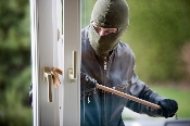 A man breaking in the home